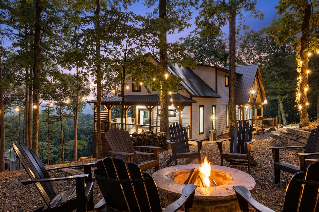 Fire pit located on left side of cabin when facing front of cabin
