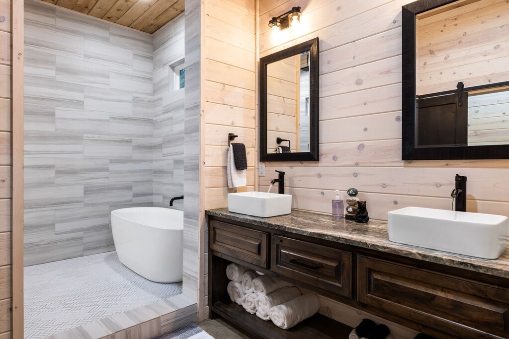 Attached master bath with dual vanity sinks downstairs