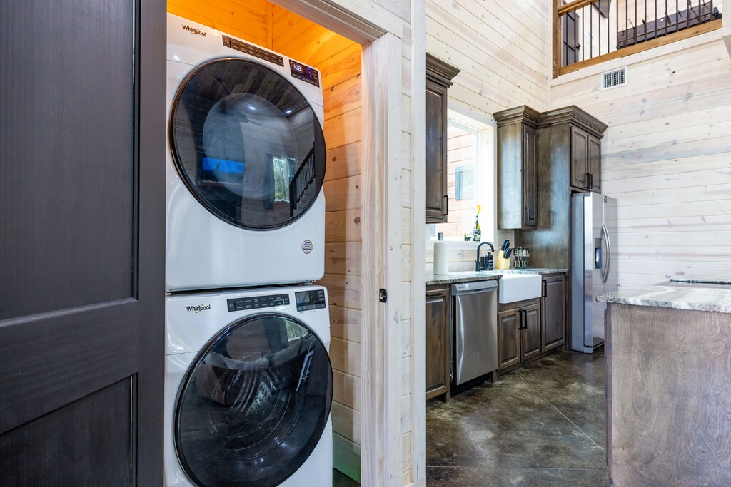 Washer/dryer beside kitchen area
