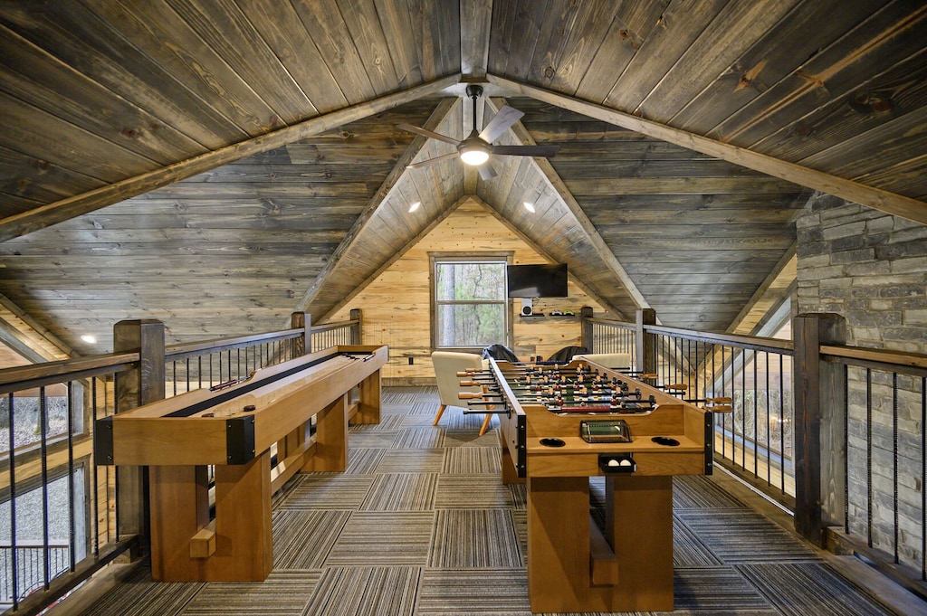 Game room upstairs includes shuffleboard, foosball & full size connect 4 board