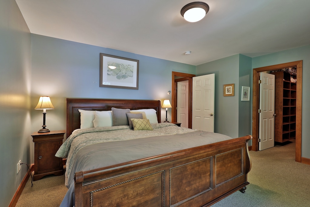 Main floor bedroom with King bed and large walk in closet