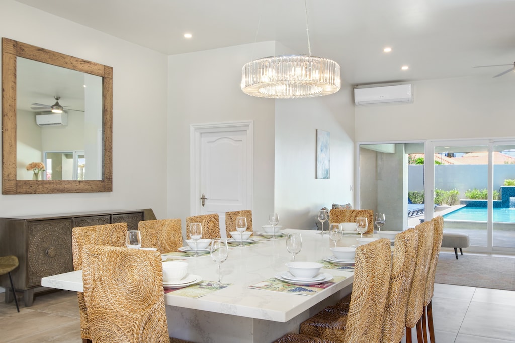 Experience the joy of togetherness at our generously sized 8-seater dining table, designed for memorable meals.