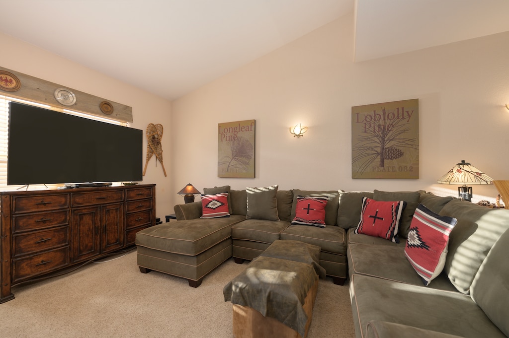 Sink into plush sectional seating where you can unwind with your favorite shows on the large TV after adventures.