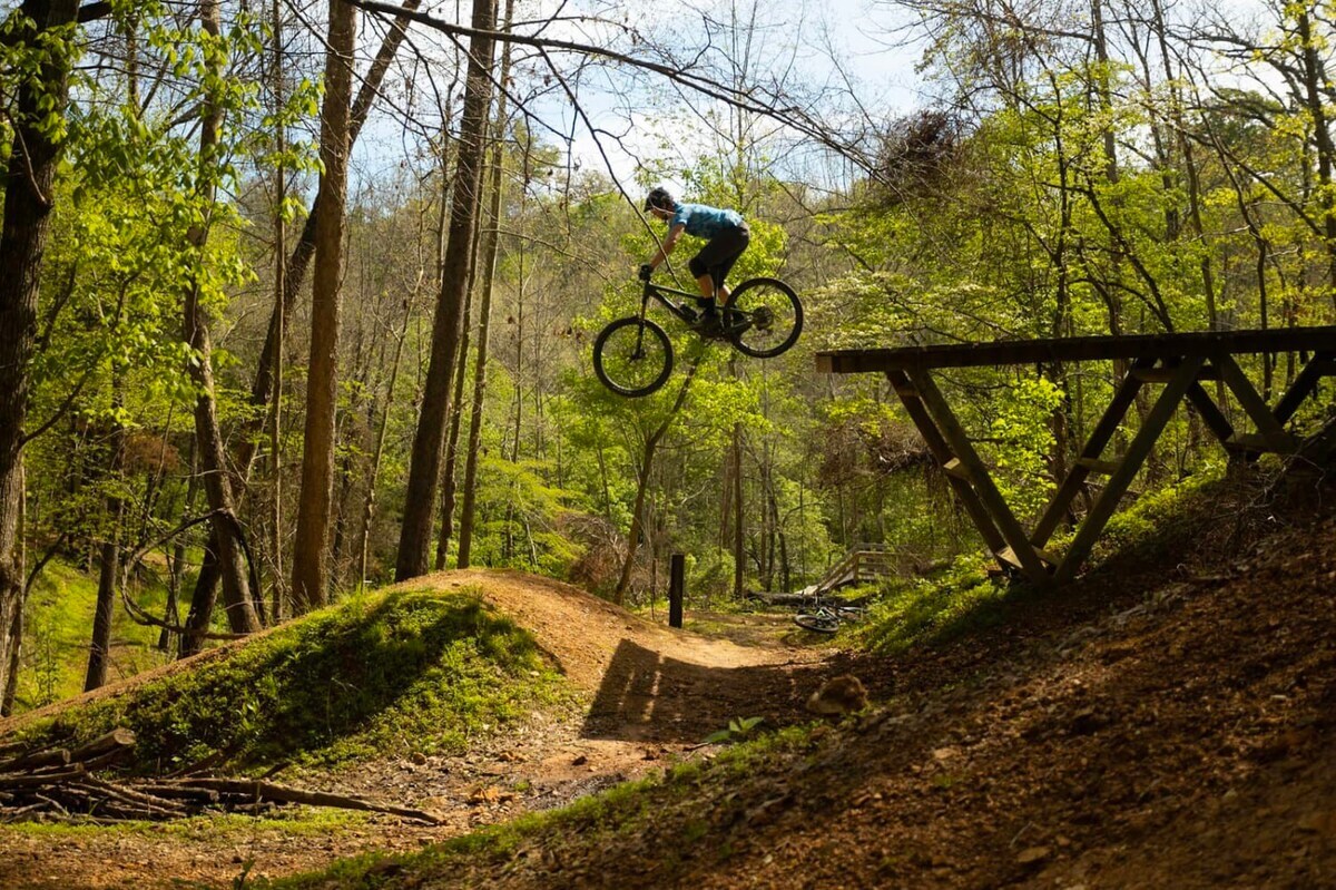 Travel just HALF a mile down the road to enjoy Coler Mountain Bike Preserve South Gateway - hike or bike one of Bentonville's premier trails!