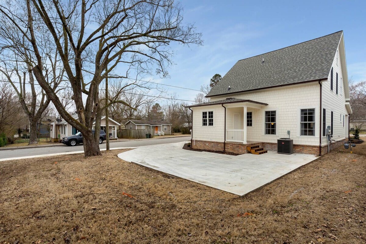 Outside the mudroom is where two cars are able to park, but as featured, there is plenty of street parking.