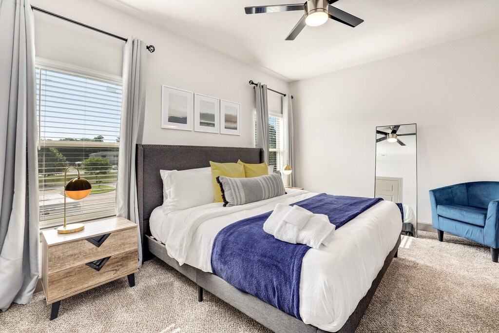 Our master suite features a plush King-size bed, luxury linens and bedding, a 35-inch Smart TV and an en suite bathroom.