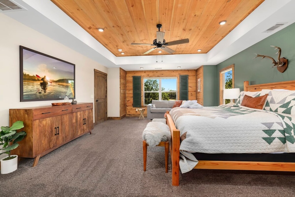 The Primary bedroom features a King-size bed, Queen-size pullout bed, dresser, closet and en suite bathroom.