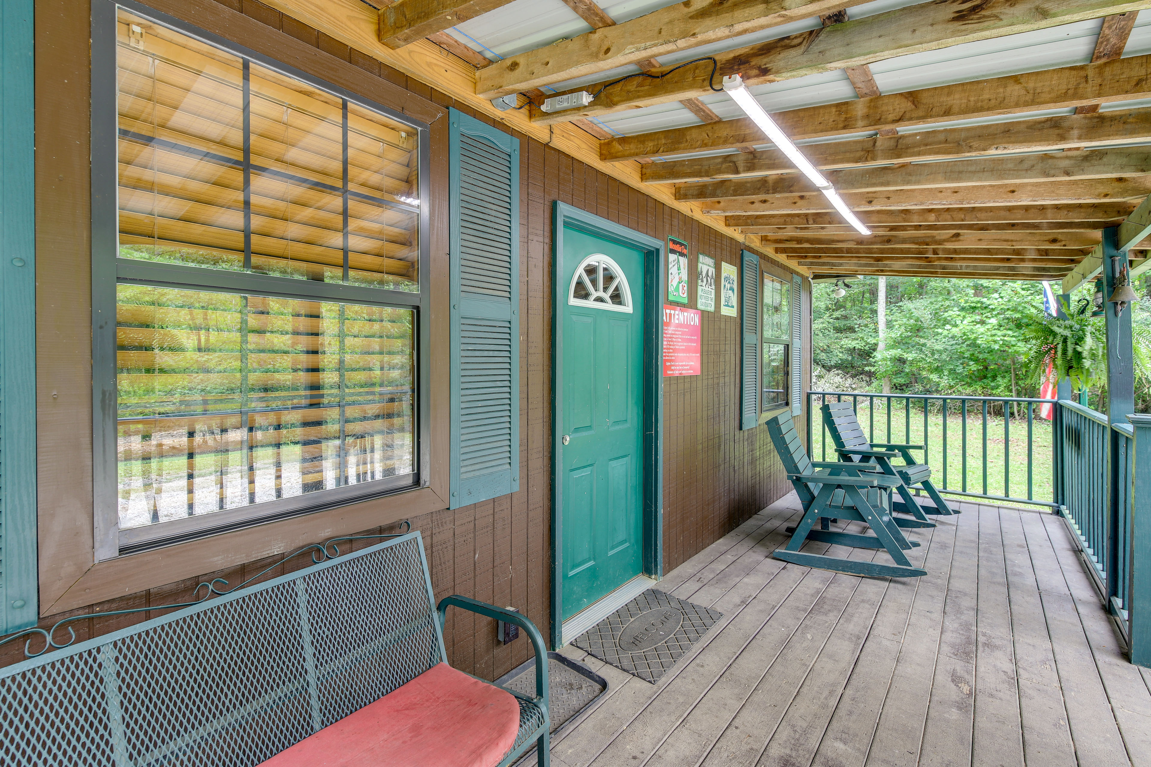 Property Image 1 - Riverfront Briceville Cabin w/ Patio & Fire Pit!