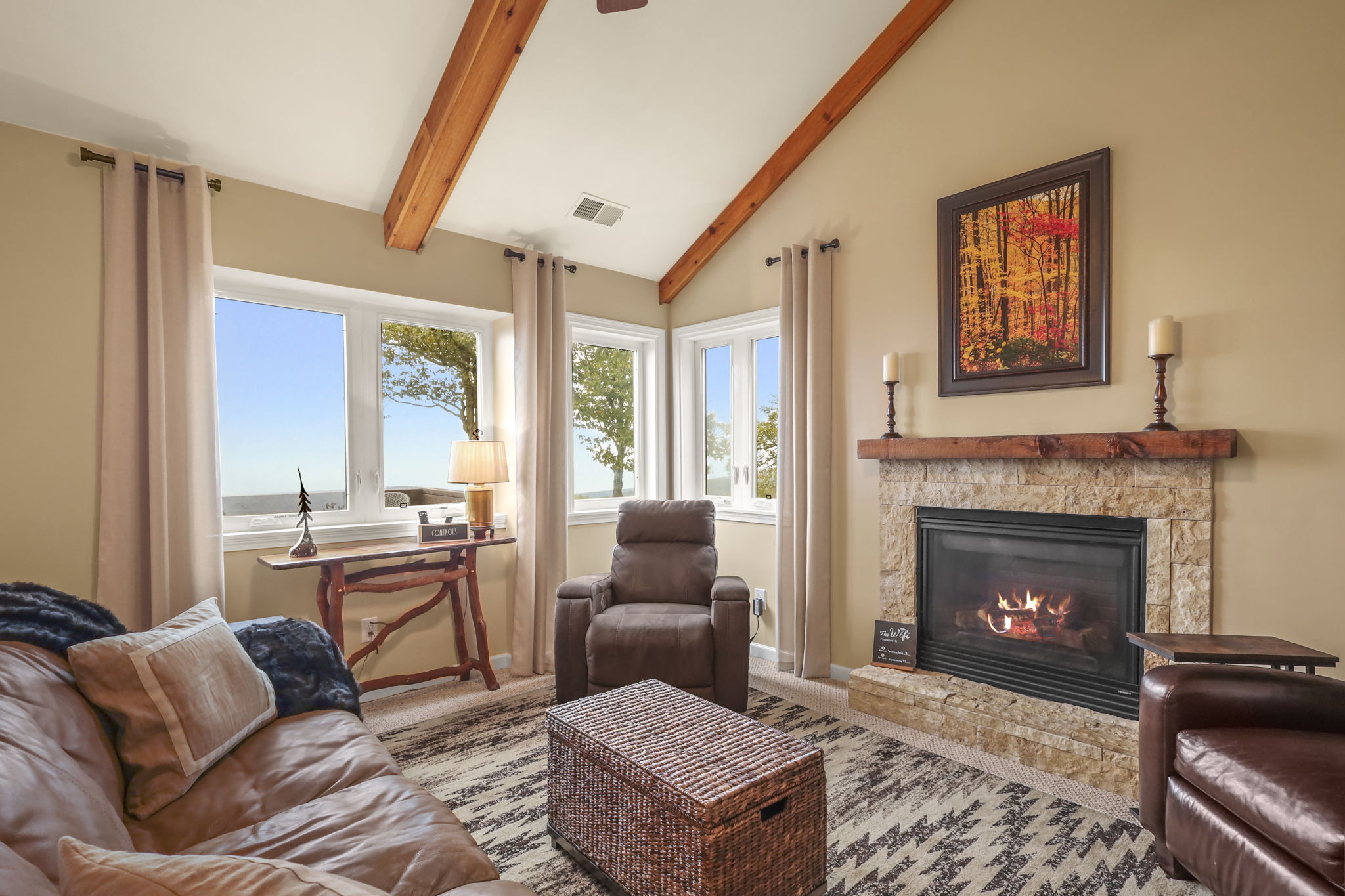 Savor the beauty of expansive mountain vistas right from your living room sanctuary!