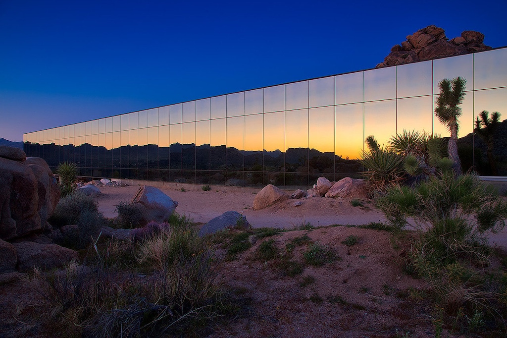 At night, the home comes alive with custom lights for any occasion