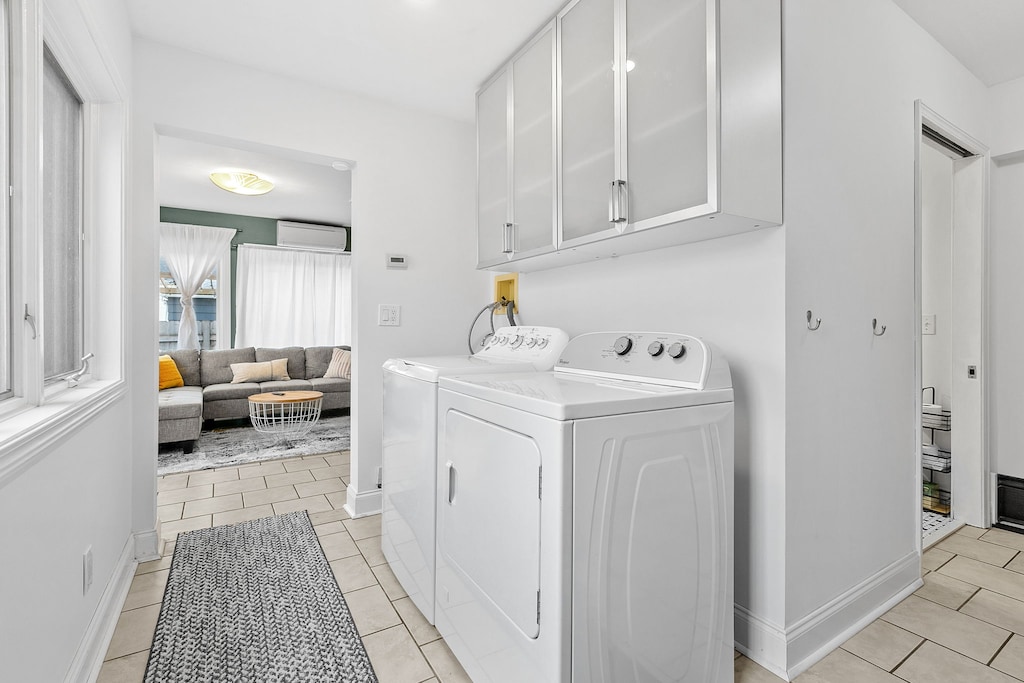 Your dedicated laundry space features a full-size washer and dryer with ample cabinet storage, making longer stays effortless and convenient.