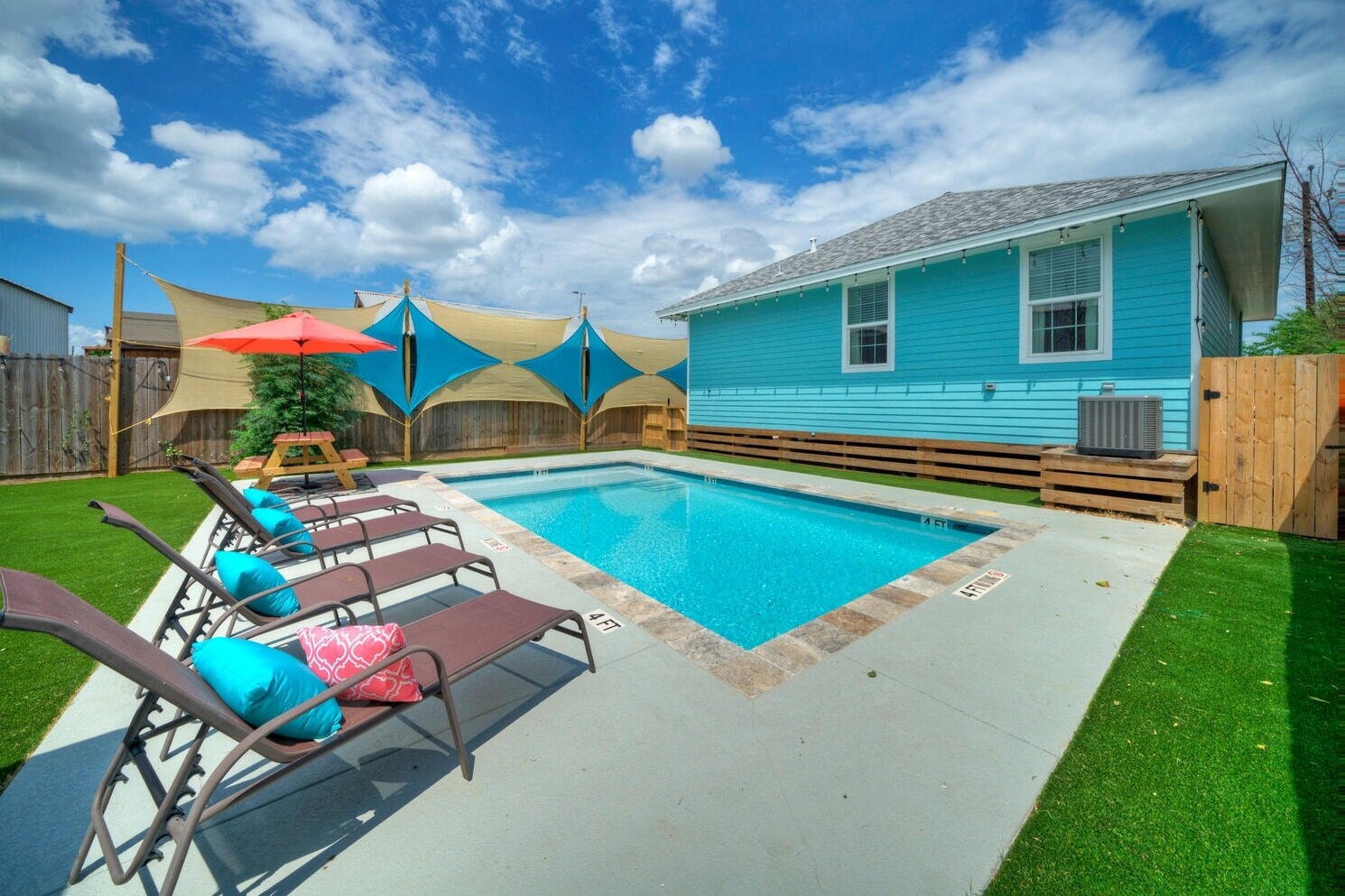 Midday bliss by the pool with comfy lounge chairs