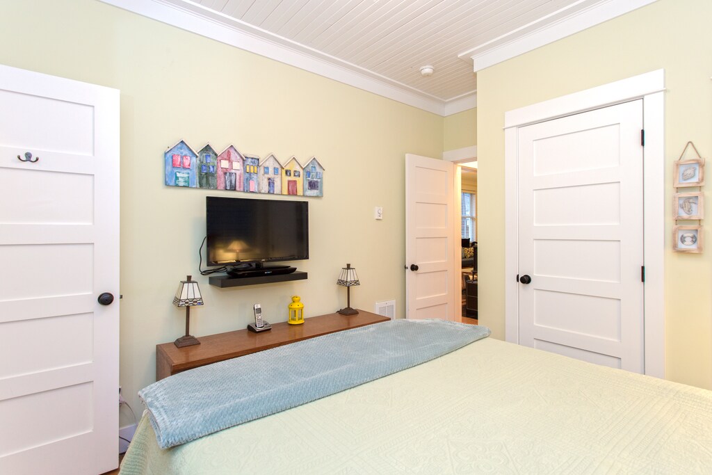 Cozy bedroom with a flat-screen TV
