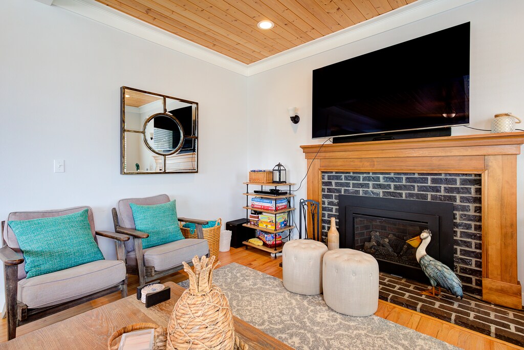 Enjoy the warmth of the fireplace while watching your favorite shows