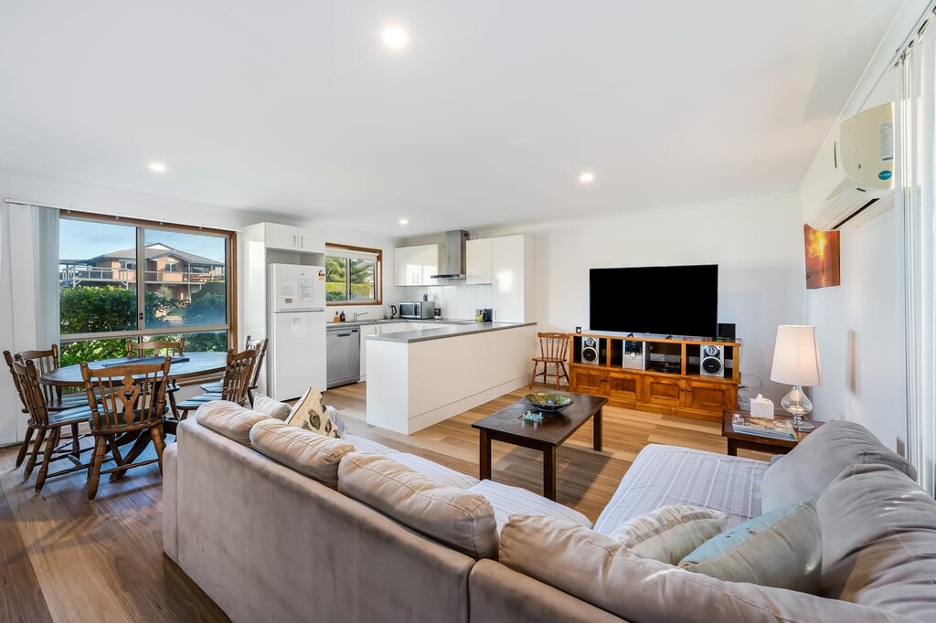 large screen tv and confy couch  for movie viewing