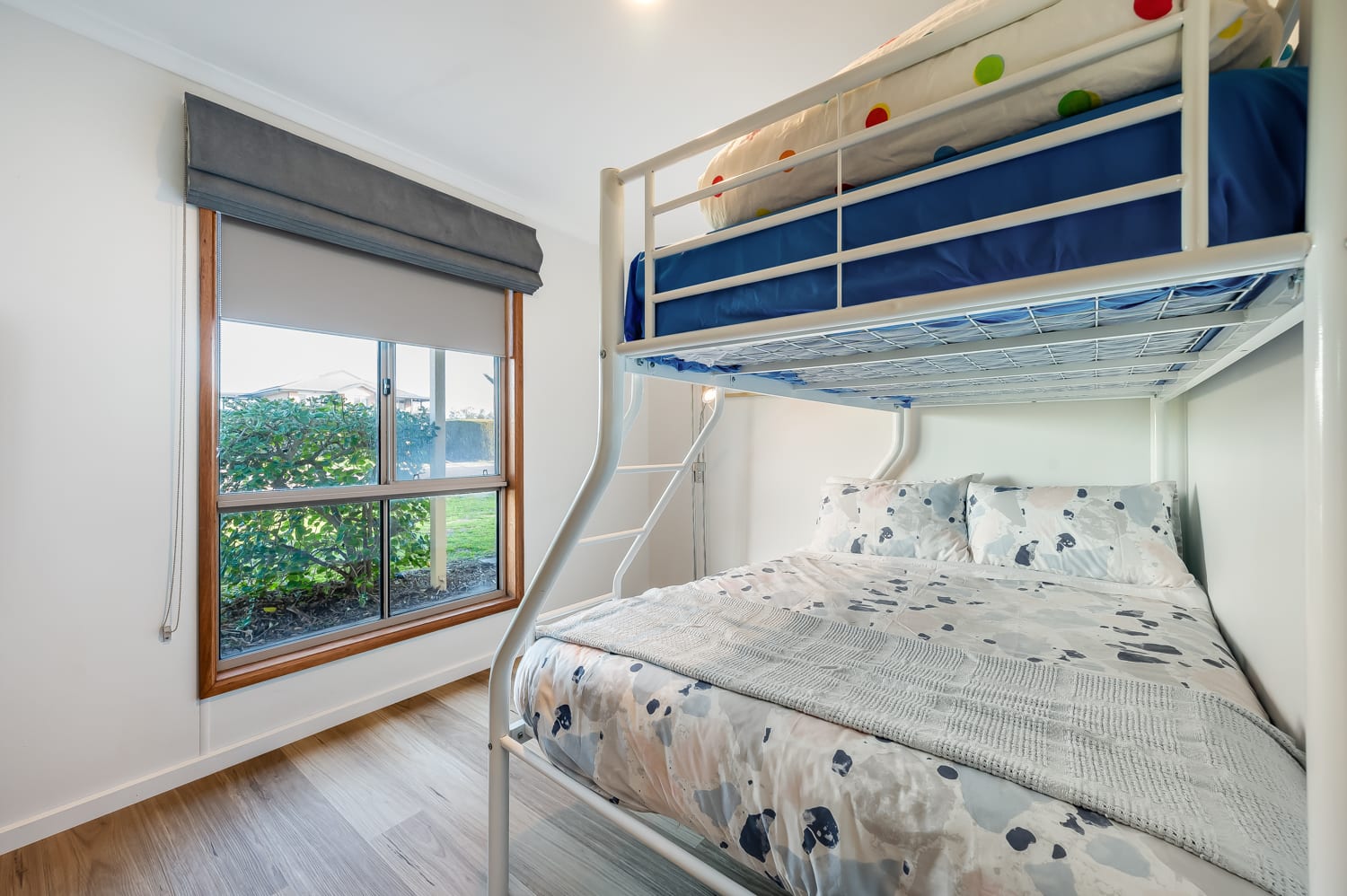 Tri bunk room with double bed and single above