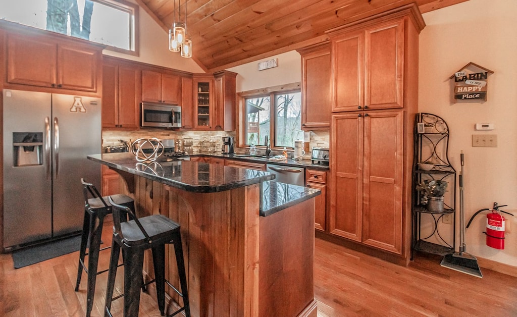 Treat Yosef Kitchen with Granite Countertops and Stainless Appliances