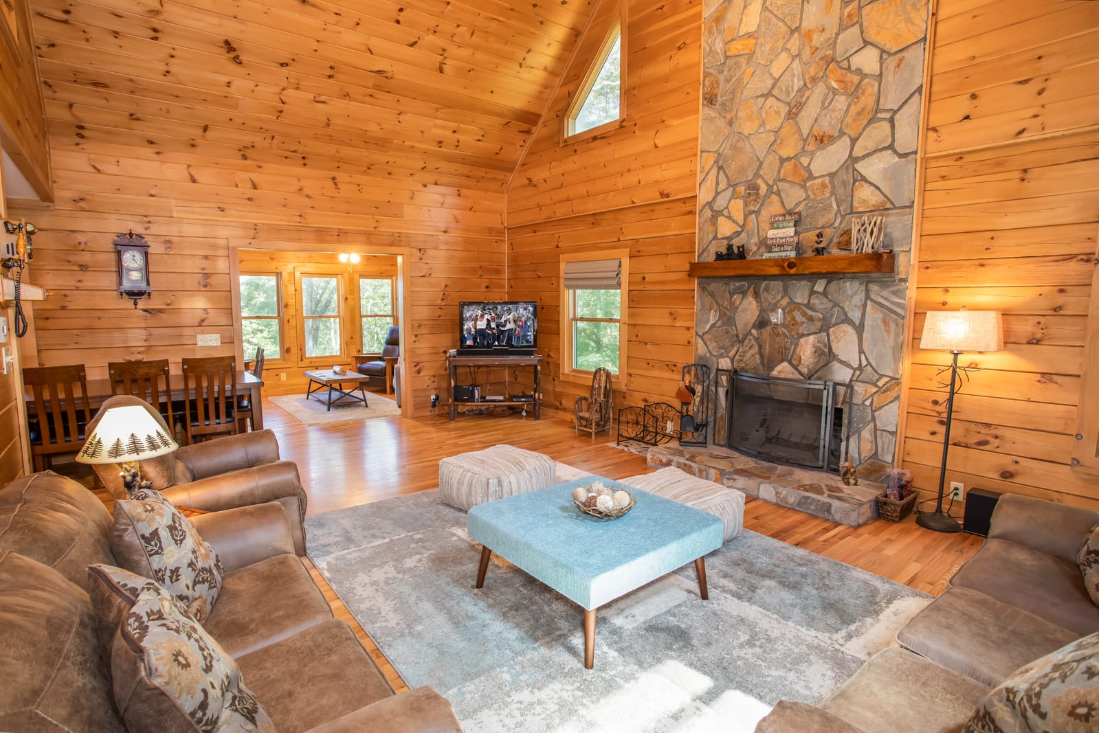 Living Room with Vaulted Ceiling, Wood-Burning Stone Fireplace, Flat Screen TV