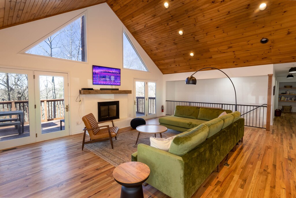 Living Room with Wood Floors and Vaulted Tongue and Groove Ceiling