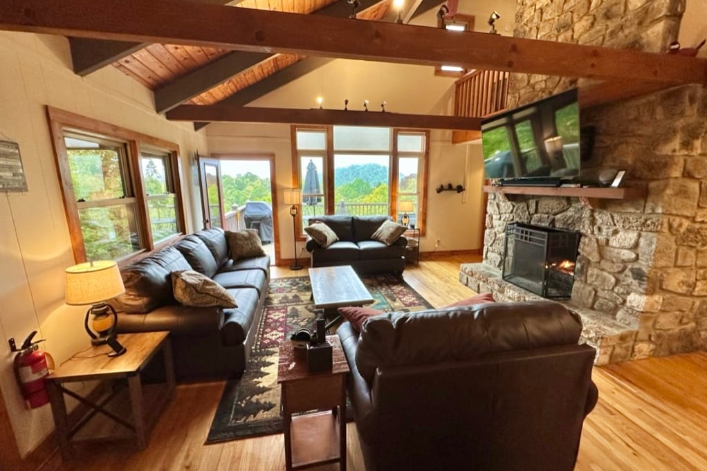 Stacked Stone Fireplace, Exposed Beams and Vaulted Tongue and Groove Ceilings