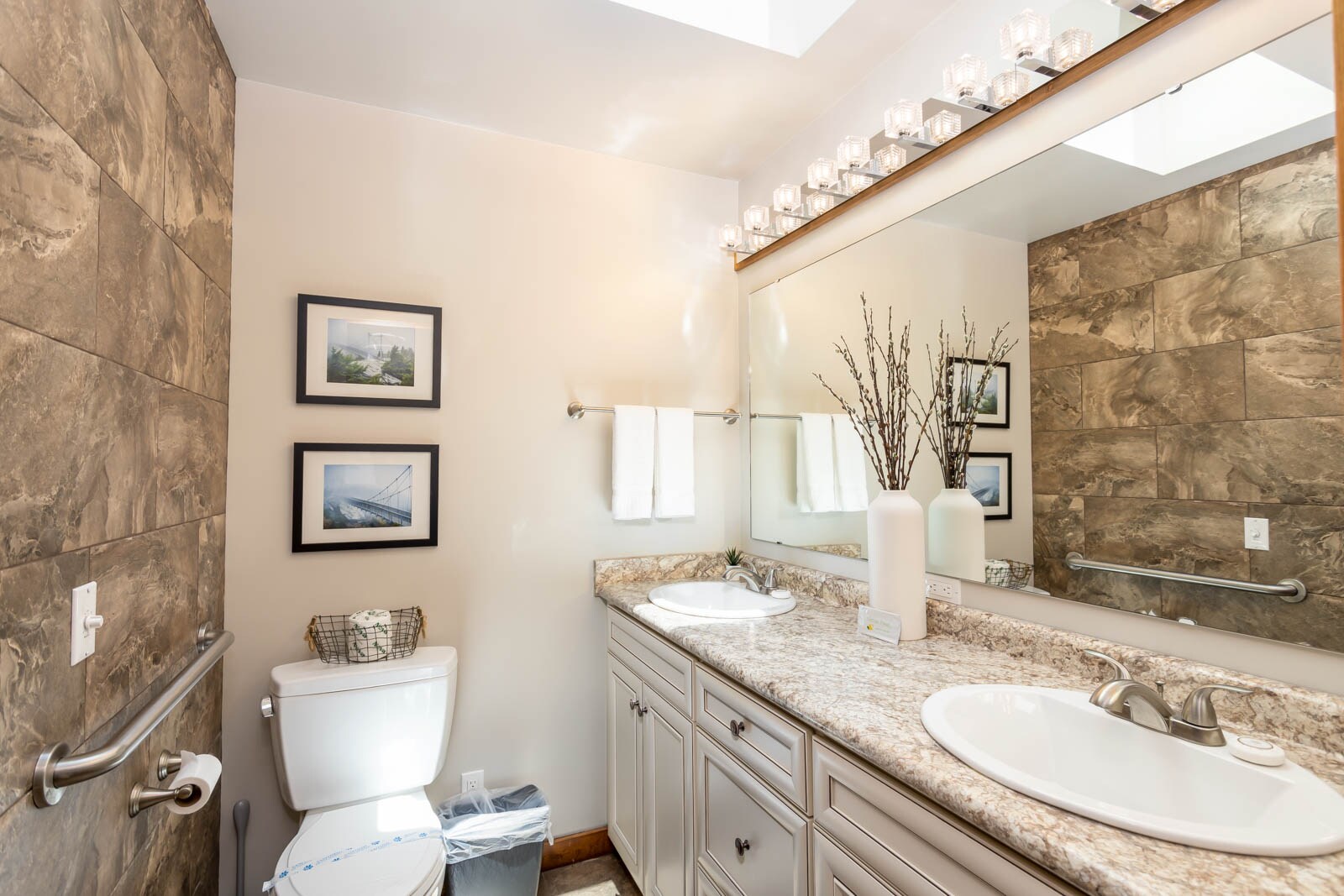 Private Ensuite Master Bathroom has Double Vanities and Large Tiled Shower