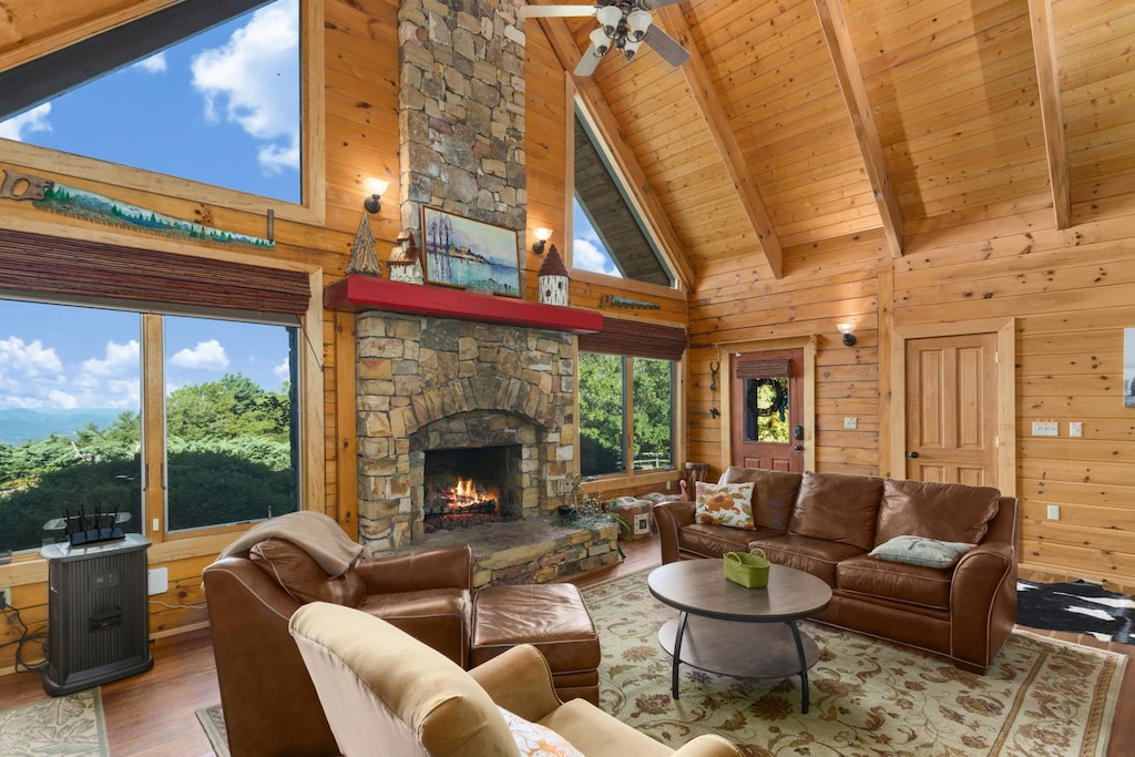 Stacked Stone Fire Place Surrounded by Windows