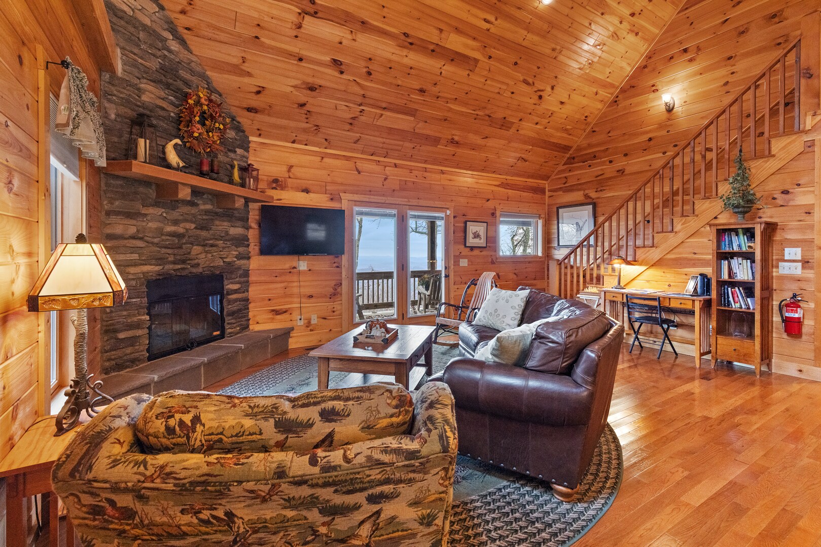 Leather Sofa and TV in the Great Room

The wood-burning fireplace is unavailable for guest use,