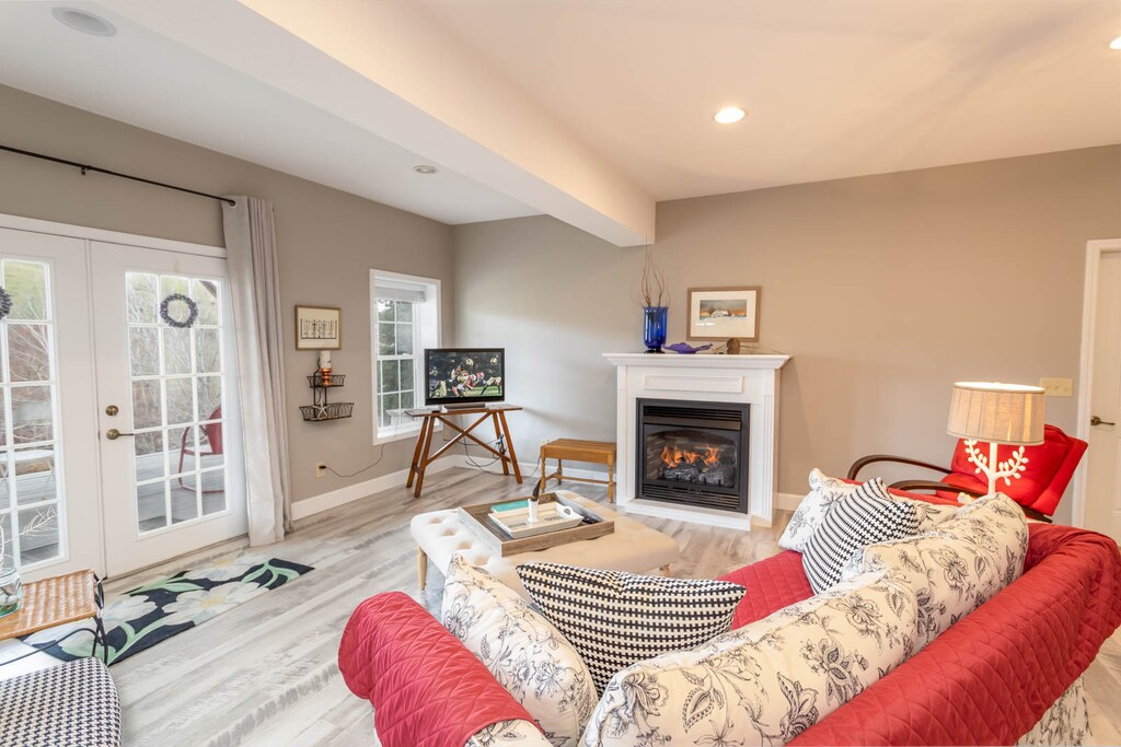 TV and Gas Log Fireplace in the Family Room