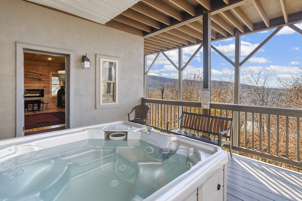 Lower Level Deck with a Hot Tub Lookout over Mountain Views