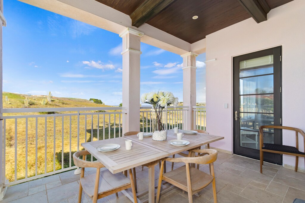 Enjoy a spectacular sunset and ocean view from the comfort of our inviting outdoor dining table.