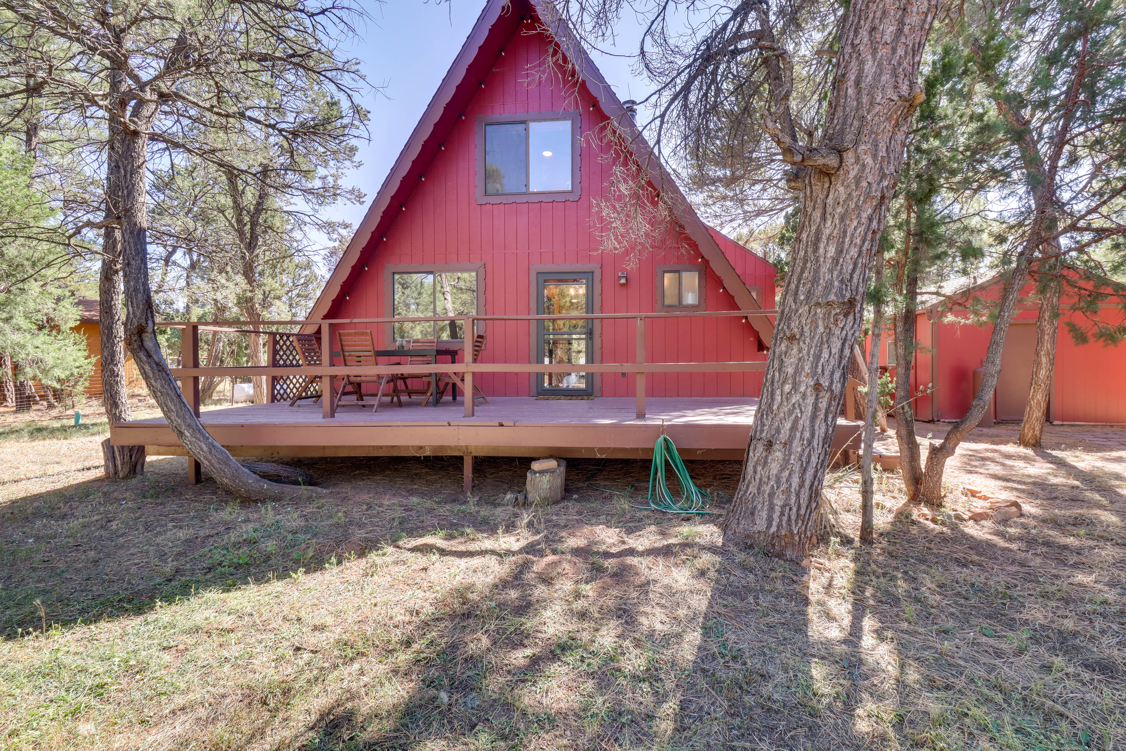 Property Image 1 - Rustic-Modern Overgaard Cabin w/ Decks & Fire Pit!