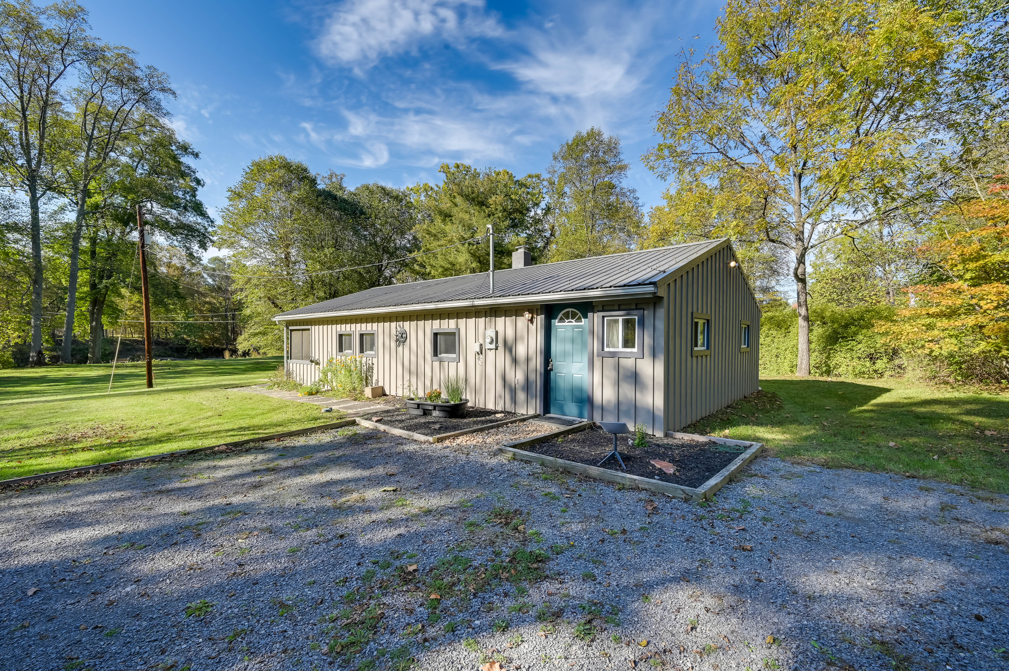 Property Image 2 - Charming Great Cacapon Cabin w/ Screened-In Porch!