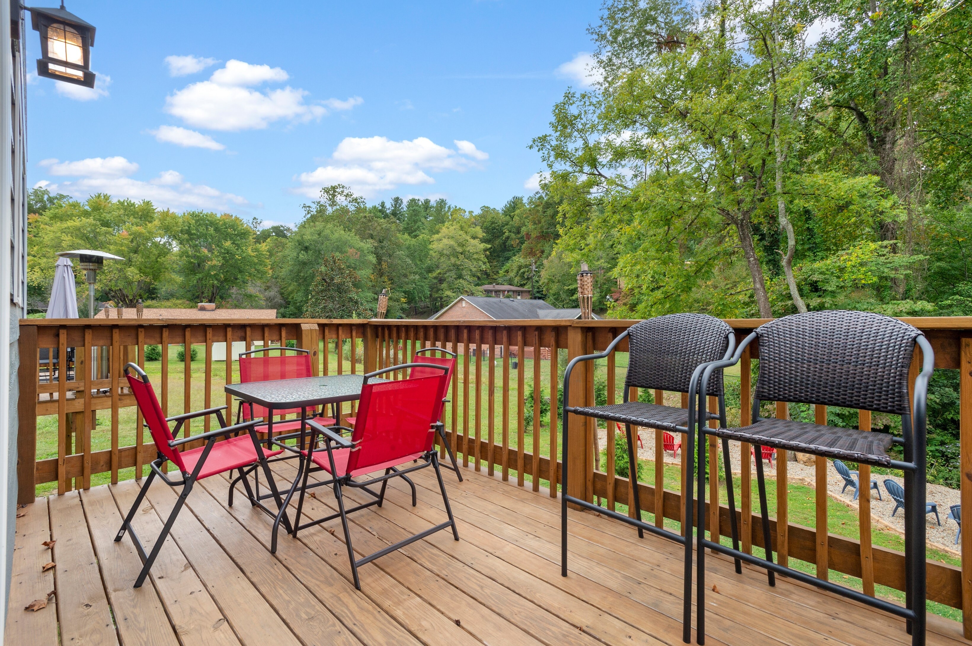 Private balcony with an al fresco dining area and BBQ grill.