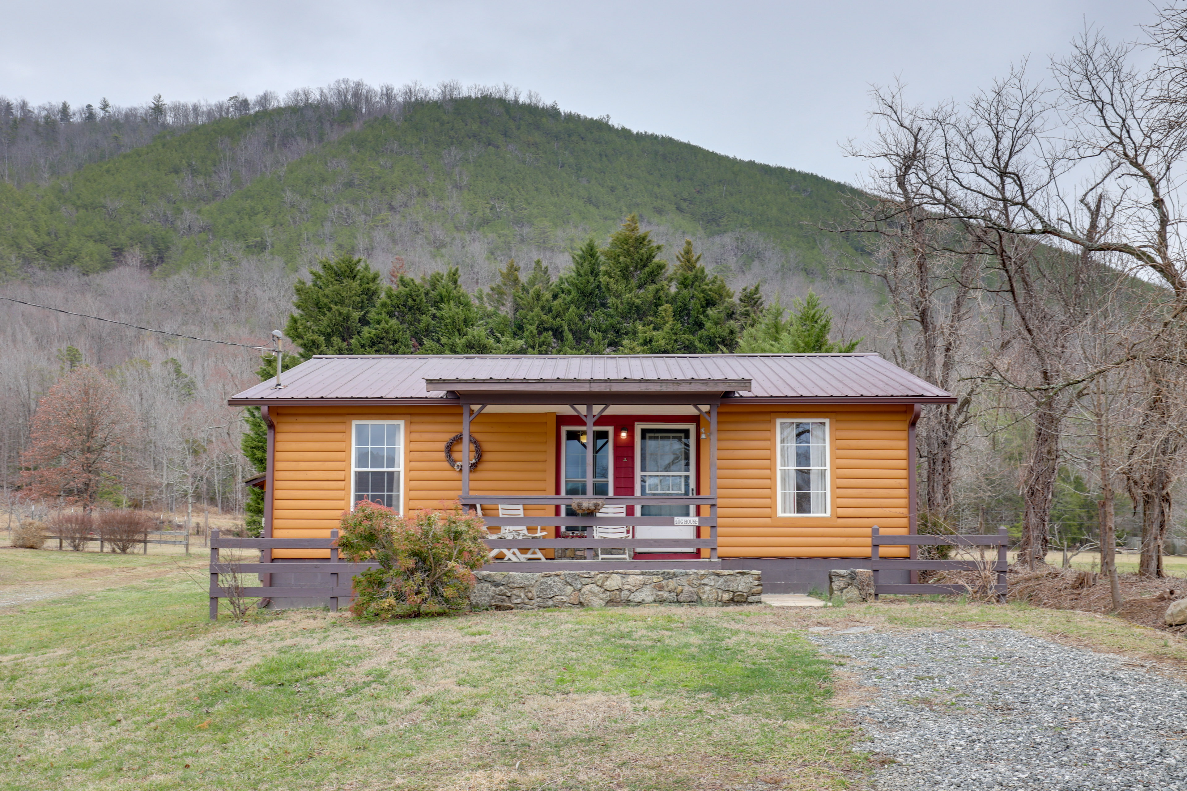 Property Image 1 - Riverfront Hot Springs Cabin w/ Private Hot Tub!