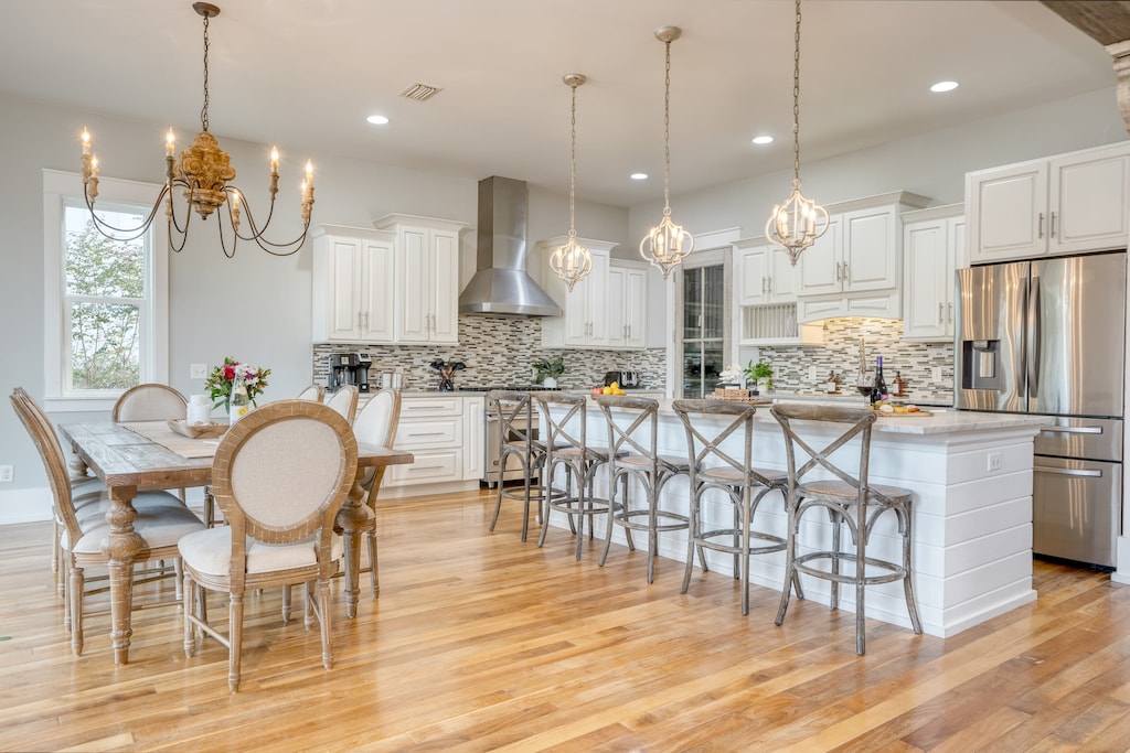 Bright, open floor plan with an elevated feel and rustic accents.