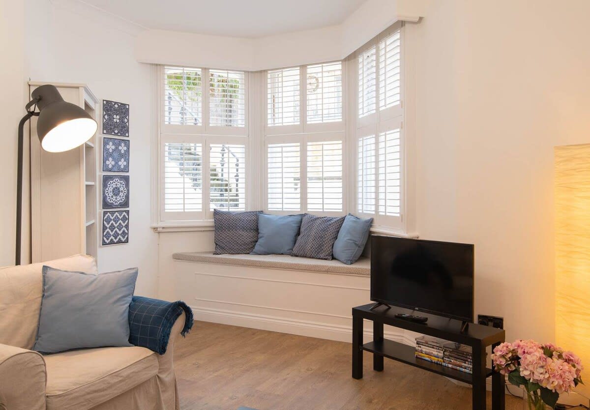 Feel at home in this light and airy living room