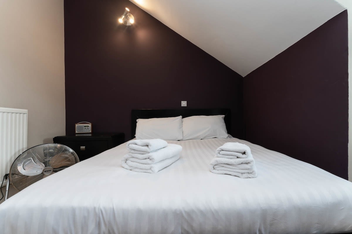A large double bedroom awaits you for a restful night sleep