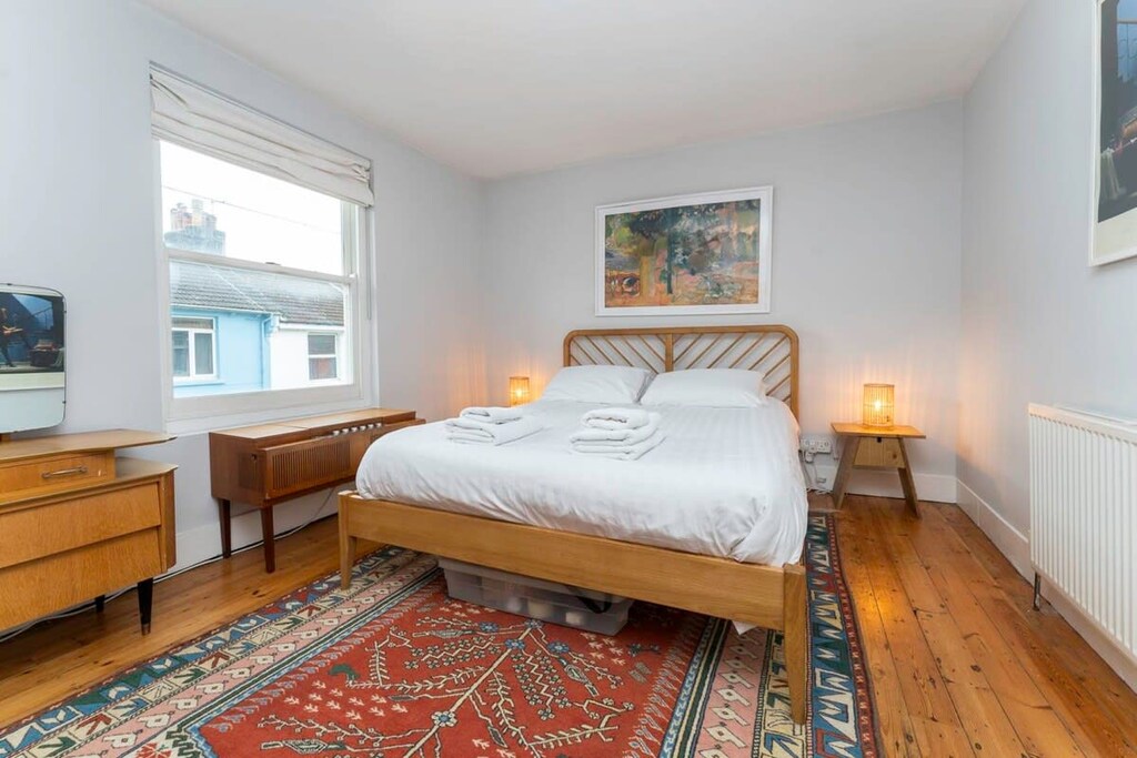Master bedroom with king size bed, duvet, pillows, fresh linen and towels.