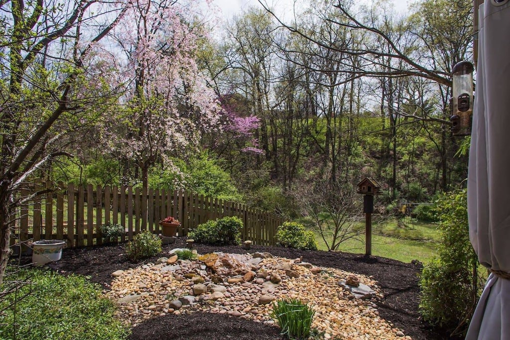 Enjoy your morning cup of coffee on the patio and enjoy the view. This rock garden is directly to the left of patio and view right outside bedroom window.