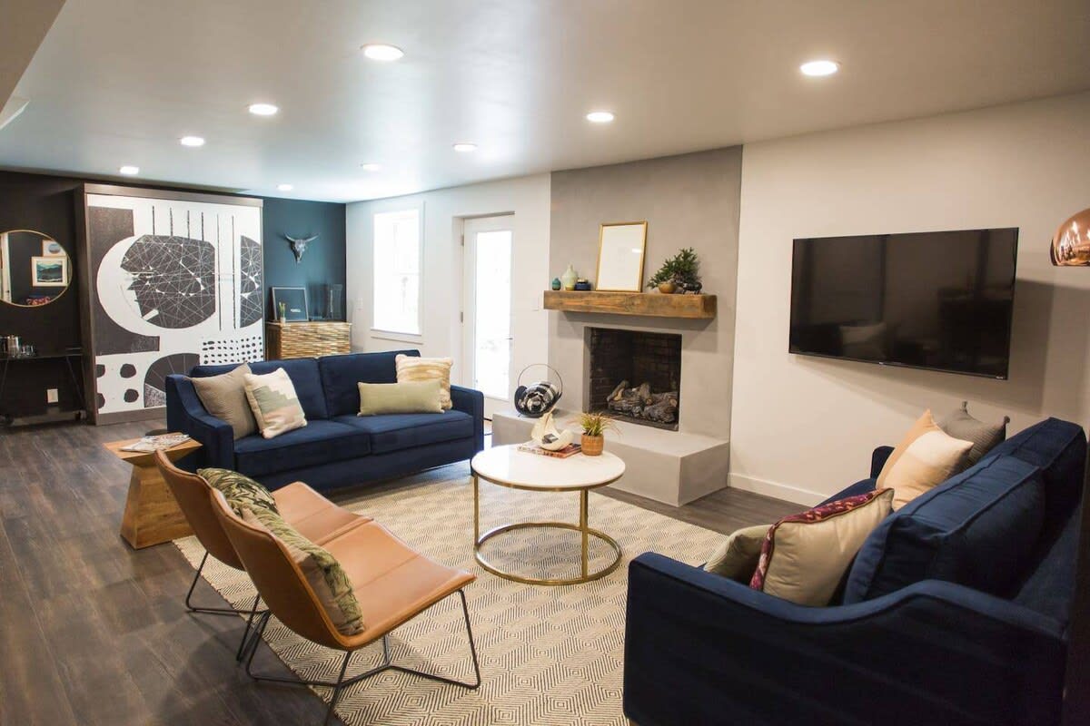 Spacious living room with West Elm seating - the sofa on the right is a Queen sleeper sofa. Working gas fireplace, 55 inch TV with streaming channels AND Cable channels.