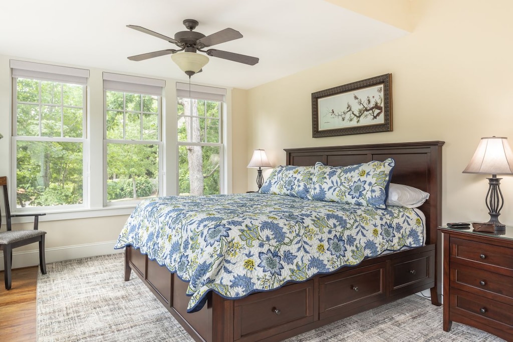 Primary bedroom on the main floor with King bed & en suite bathroom.