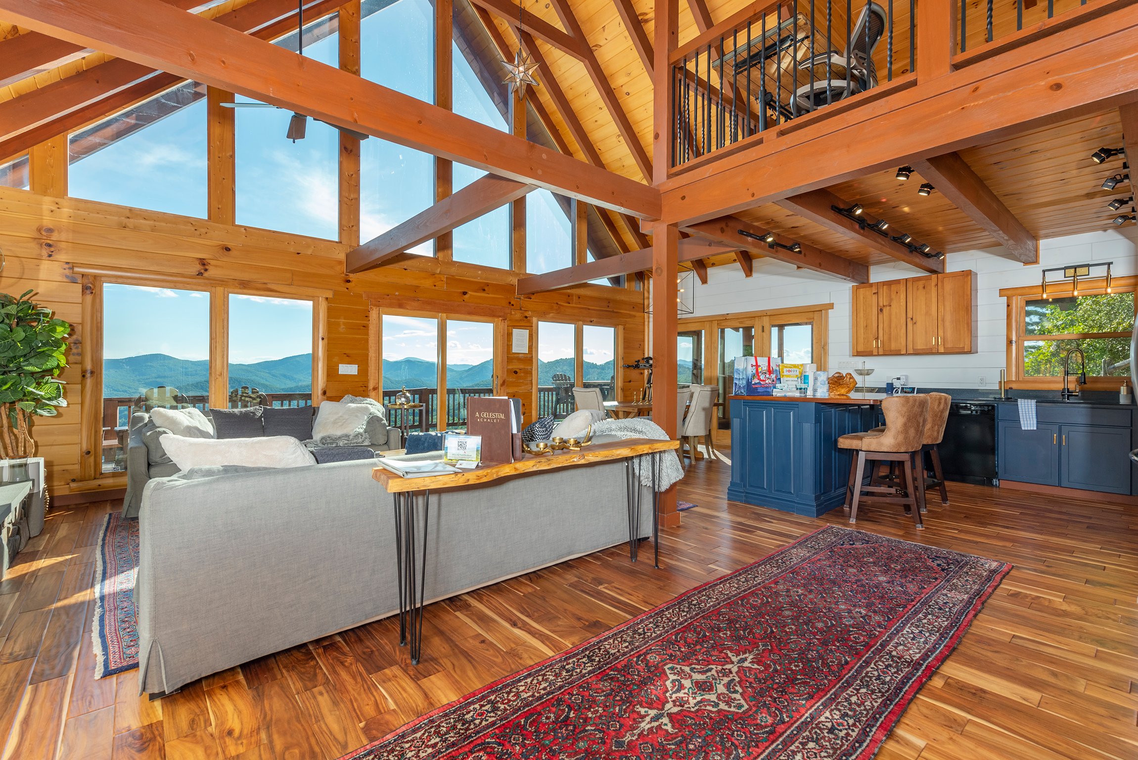 Floor-to-ceiling windows and an open loft contribute to the luxury feel of A Celestial Chalet.