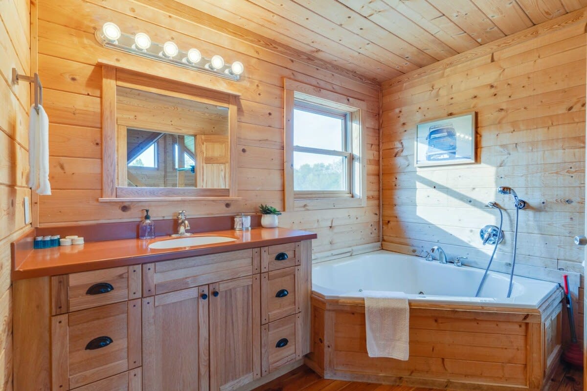 Upstairs bathroom w/tub and walk-in shower - between bedroom 2 & 3.