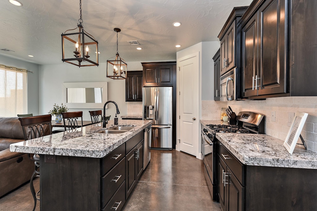 Enjoy preparing meals on our spacious stove and granite counter tops.