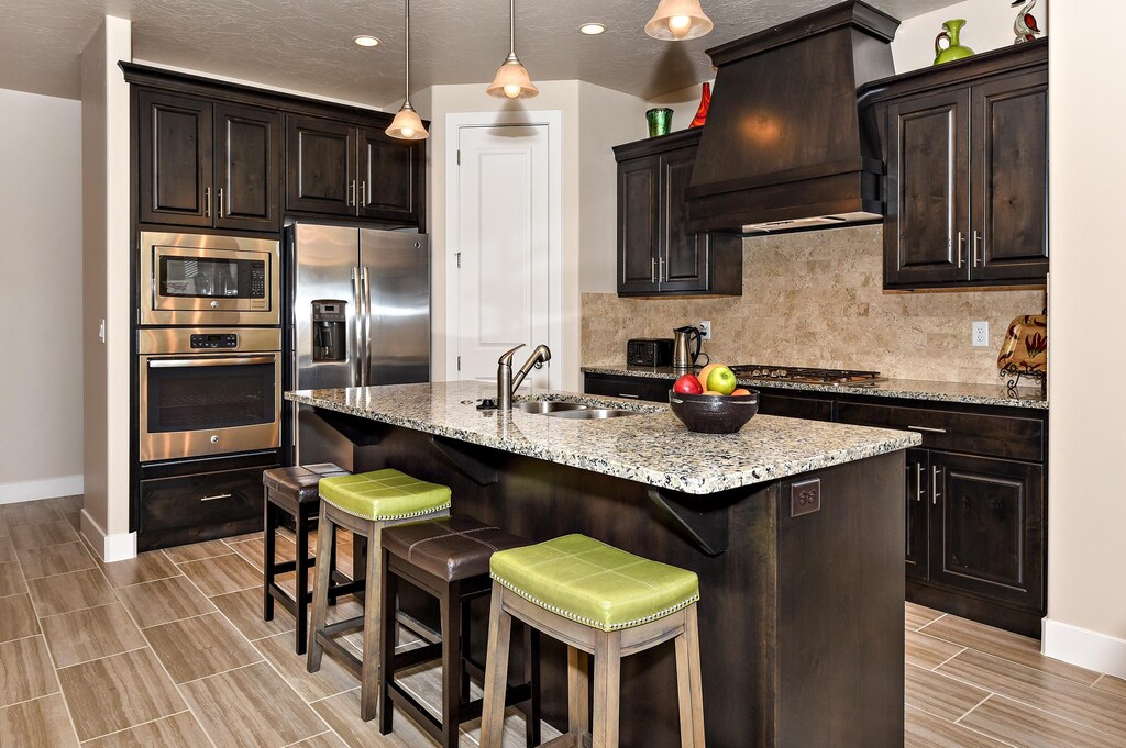 The Kitchen is complete with everything you will need for meal preparations including pots, pans, baking dishes, plates, cups, silverware, cutlery, and an assortment of cooking utensils.