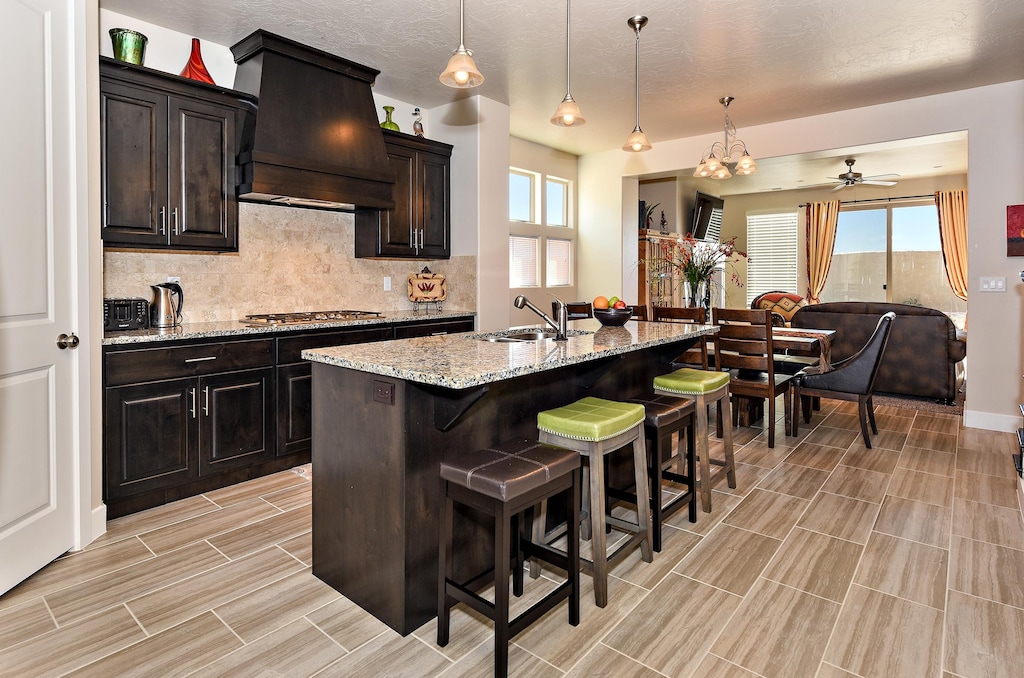 The Kitchen Island comfortably seats 4 adults and creates a great space for serving and preparing meals. 