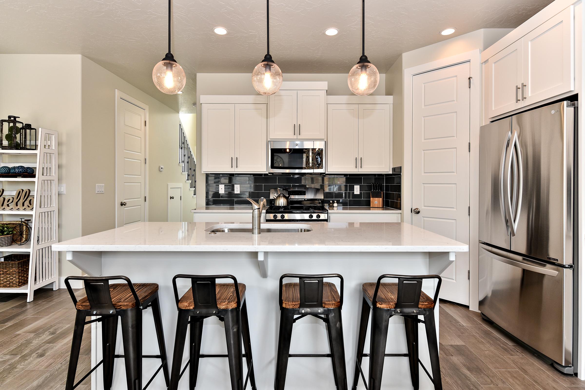 The Kitchen Island comfortably seats 4 adults and creates a great space for serving and preparing meals. 