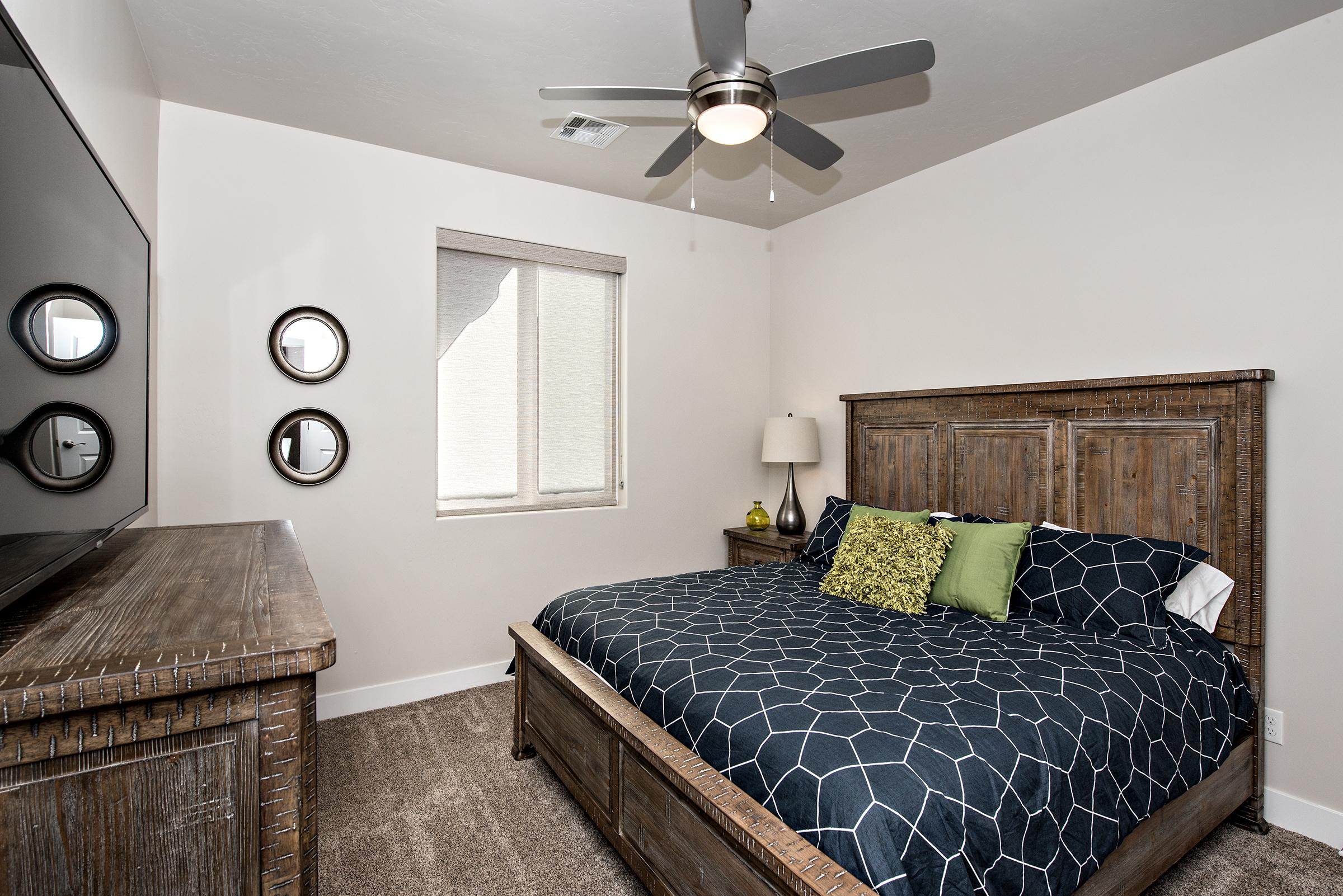 Bedroom 2 has a King bed, private TV and walk-in closet.