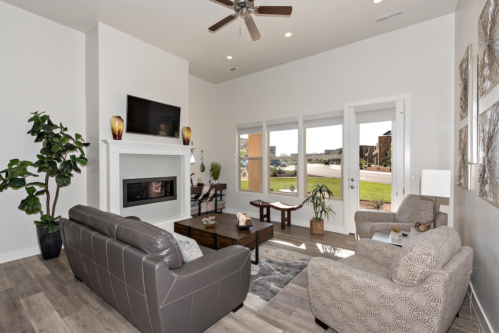 The Living Room is located adjacent to the dining room and is the perfect place to relax and watch your favorite movie or TV program.