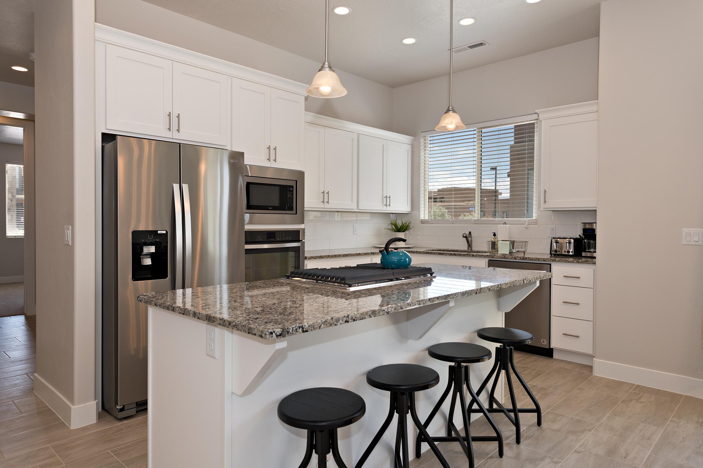 The Kitchen Island comfortably seats 4 adults and creates a great space for serving and preparing meals. 